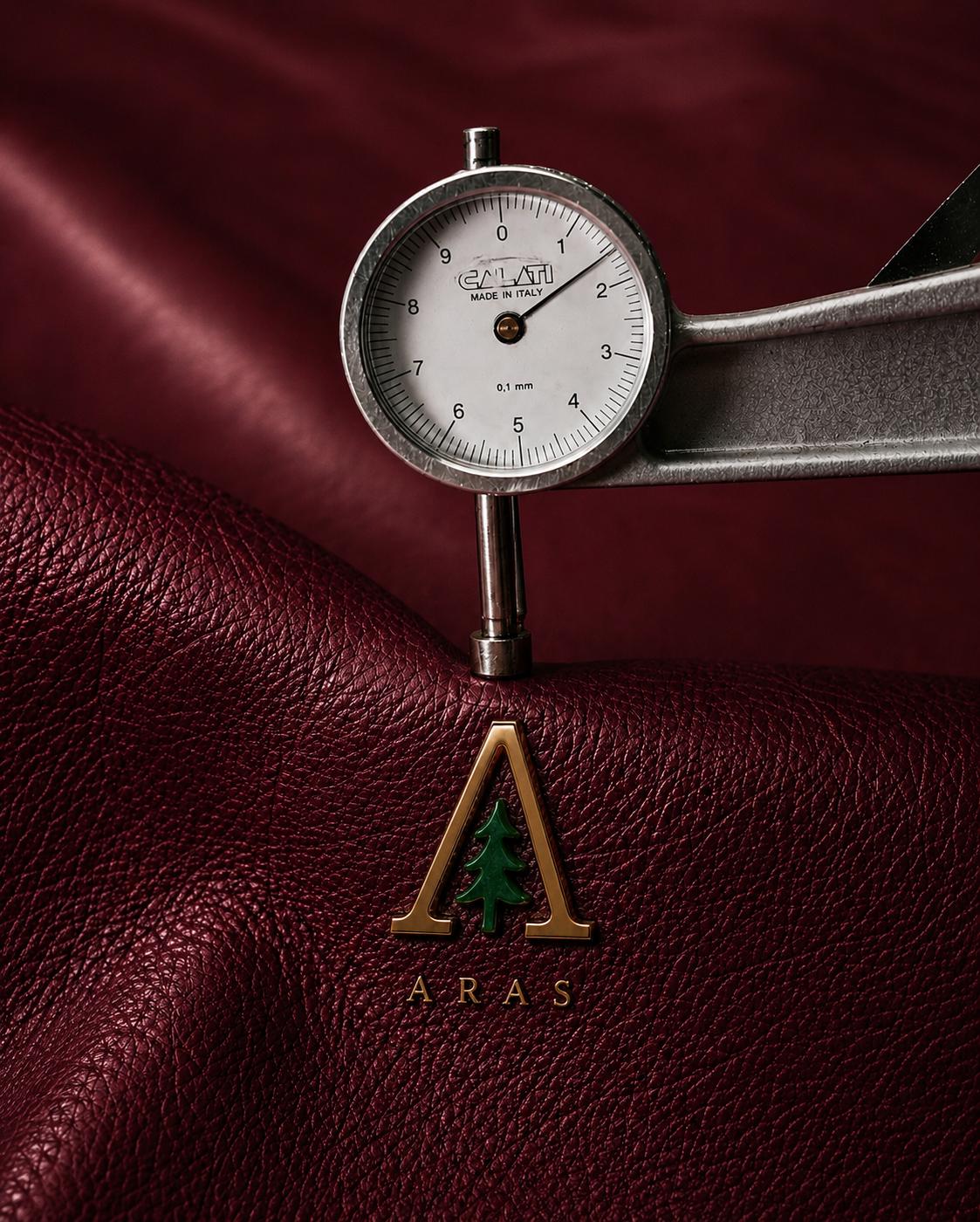 Italian caliper measuring burgundy leather with the ARAS emblem