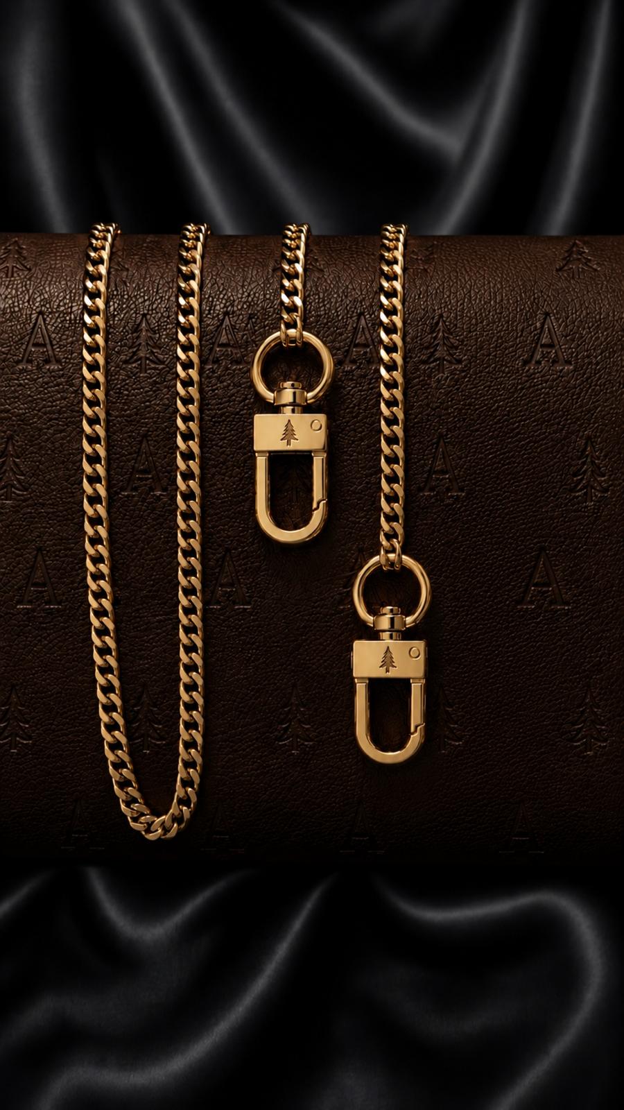 Gold chain and dual clasps on tree-embossed leather